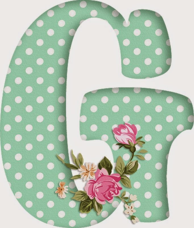 Alfabeto decorativo verde com bolinhas brancas e flores